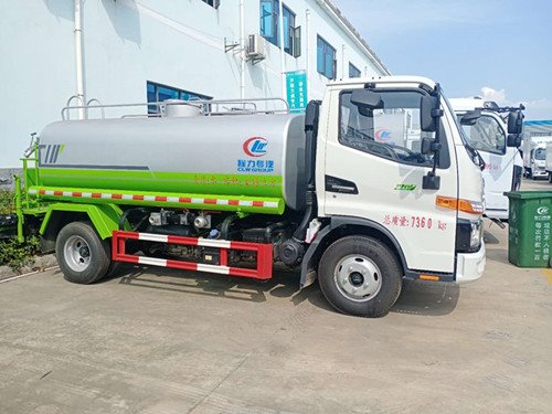 國六帶翻轉(zhuǎn)駕駛室駿鈴灑水車