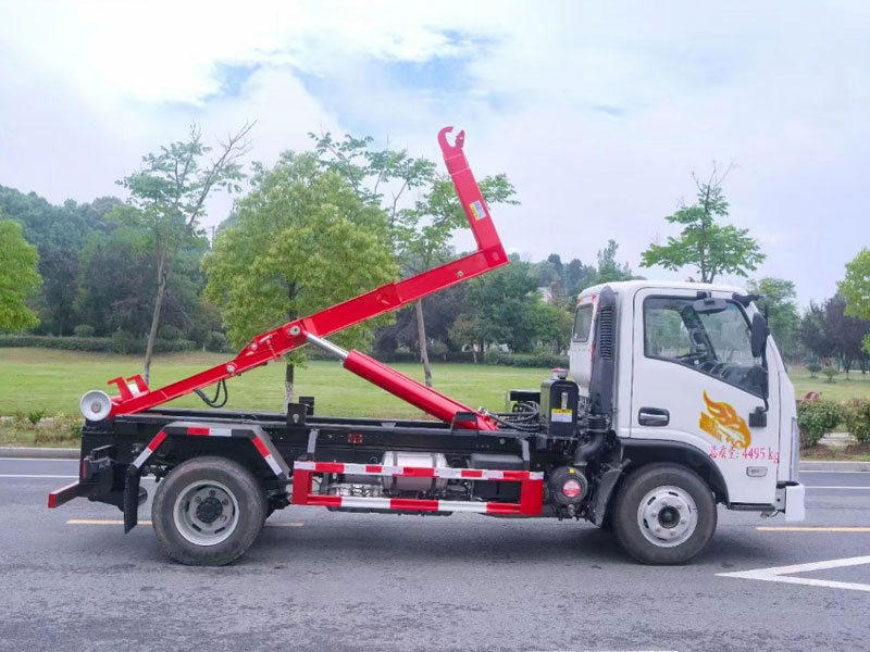 重汽豪曼3280軸距藍(lán)牌勾臂垃圾車(chē)